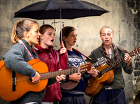 Four Lovely Young Ladies Singing in the Rain
