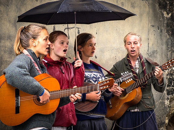 Four Lovely Young Ladies Singing in the Rain