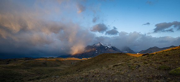 Sun hitting low clouds, Torres Del Paine