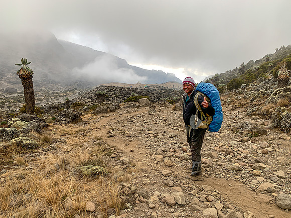 Moses heading back down to Baranco Camp